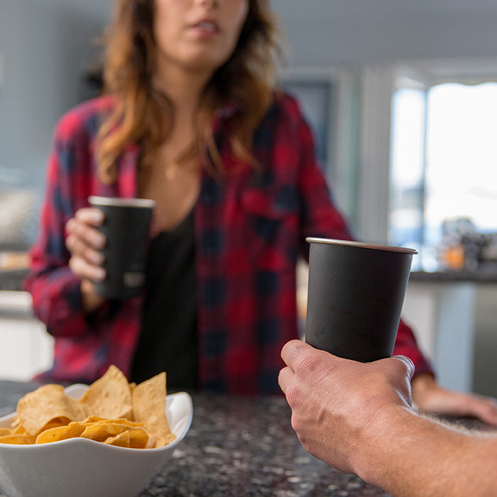 16oz-pint-cup-d4 16ounce_steel_pint_cup_black_party_lifestyle_e7c4b89f-bee2-44df-bb63-bc286febb421.jpg
