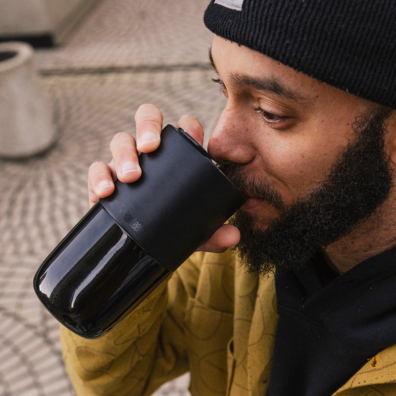 daily-on-the-go-set-r2 16oz_rise_tumbler_black_man_drink_square.jpg