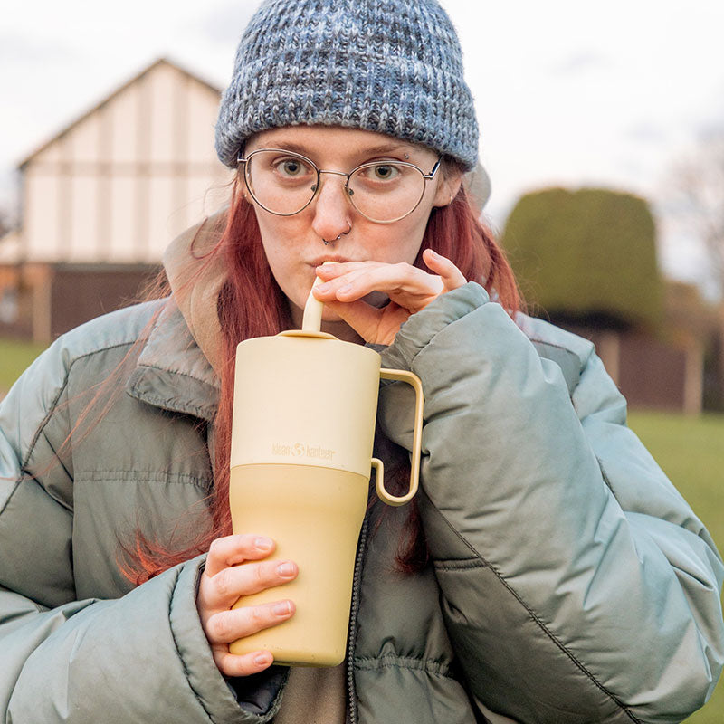 26oz-rise-tumbler-with-straw-lid-k8 26oz_rise_rumbler_straw_wax_yellow_woman_sip_square.jpg