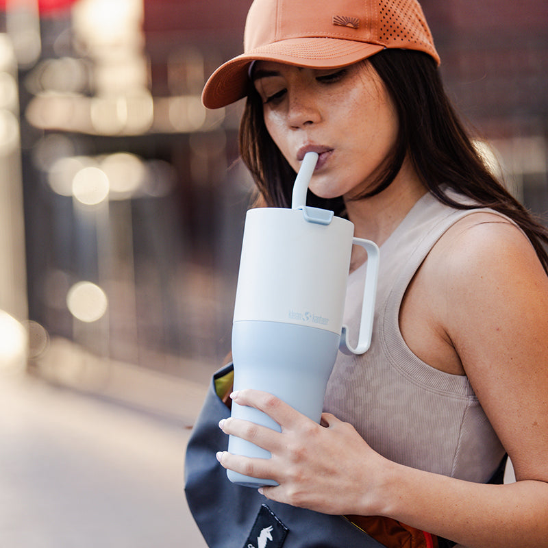 36oz-rise-tumbler-with-straw-lid-m4 36oz_rise_tumbler_straw_girl_sip_square.jpg